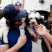 Josh Condon hangs out with his dog, Jet, during the Taste of Ann Arbor on Sunday, June 2. Daniel Brenner I AnnArbor.com